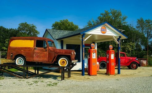 Old car at gas station - 'One Stop Shop'